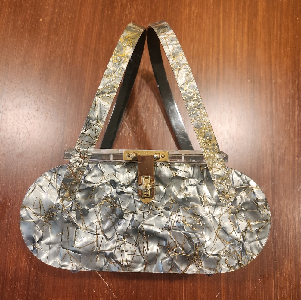 Vintage 1950s Lucite Confetti Bag carved panel top and hand strap